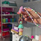 8-second product video showing pastel beaded teacher lanyard sparkling in classroom light